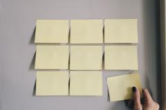 Post-It notes  on board representing discussion topics
