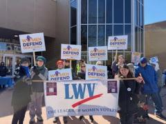 League members with banner at March 2026 No Kings Rally