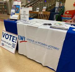 Voter services table at Fort Atkinson library