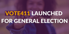 Text Reading "Vote411 Launched For General Election" over a blurry photo of a person holding up a button that says "vote"