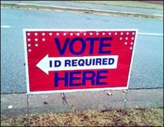 Vote here. ID required. Posted vote sign.