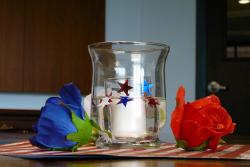 red & blue flowers, candle holder with blue stars