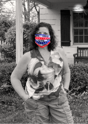 Woman wearing a VOTE face mask
