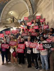 Voting rights advocates on the steps in the Capitol rotunda