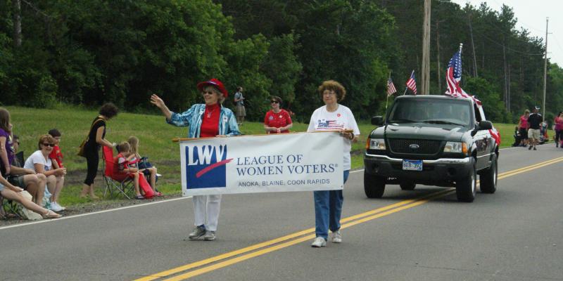 LWV ABC members participating in parade Members holding banner in parade