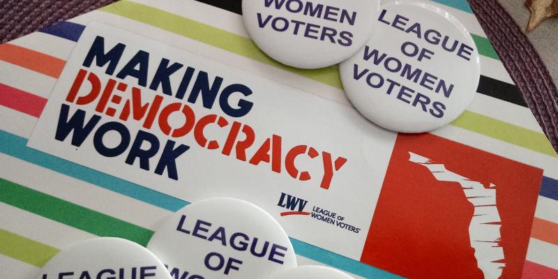 Making Democracy signs and LWV pins