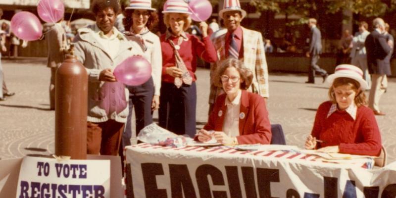 registering voters at registration table c. 1970s