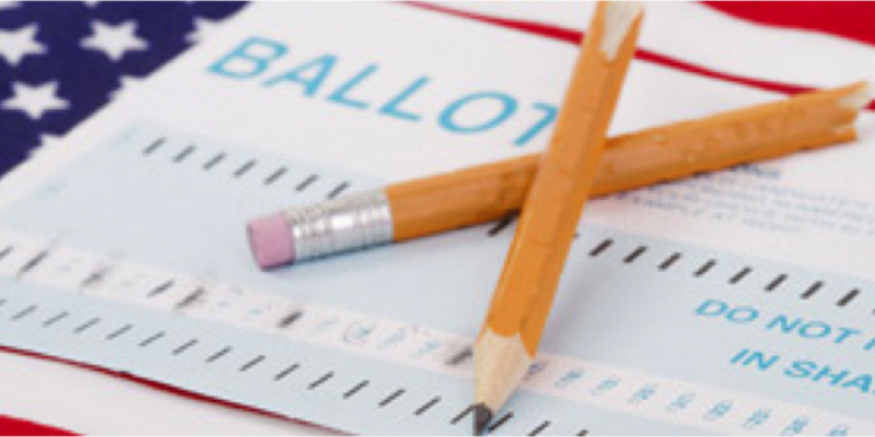 two pencils on top of a ballot