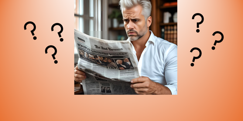 mand reading newspaper confused