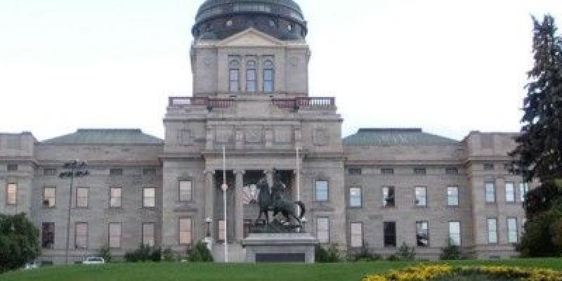 image of Montana state capitol building with flower beds in foreground
