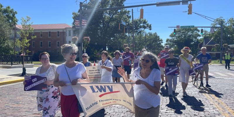 Oxford League of Women Voters marching in the 2024 Oxford Freedom Festival Parade