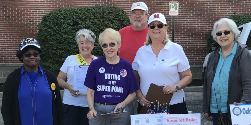Voter registration table at Oxford farmers market in the fall of 2023