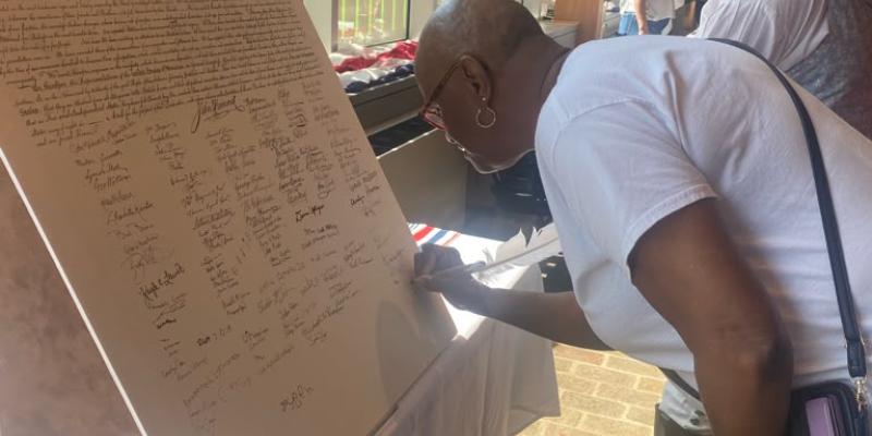LWVPC President Signs the Declaration of Independence at Historic Arkansas Museum's Frontier Fourth