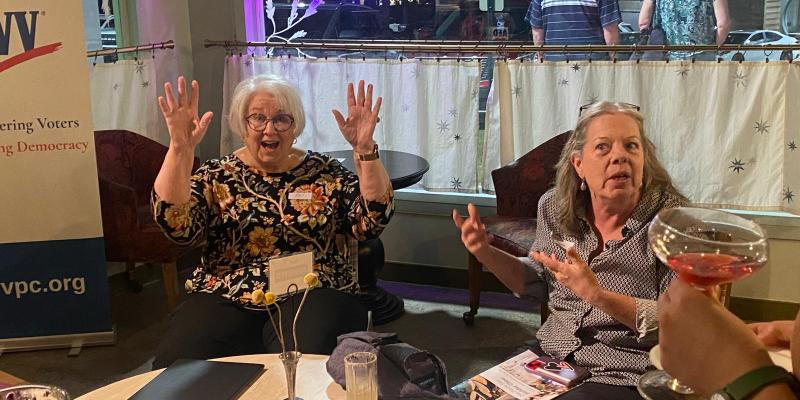 LWVPC members engage in conversation at The Root Cafe for an Arkansas Rising Event.
