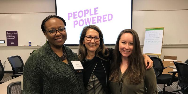 3 female members pose for photo - PEOPLE POWERED