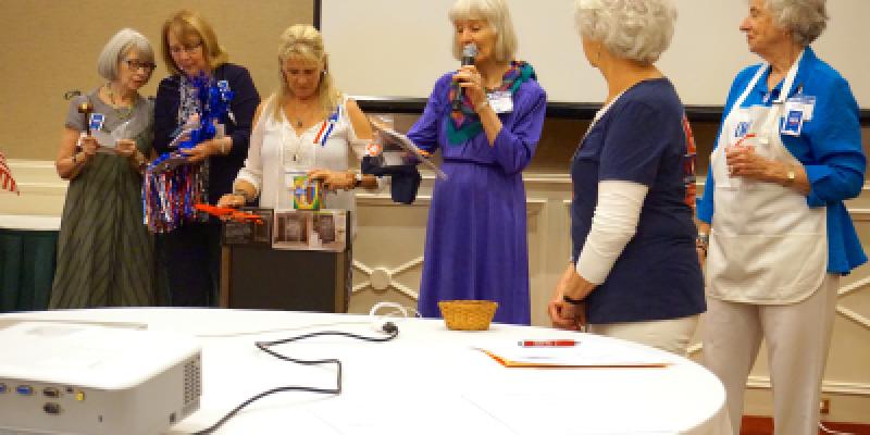 Three past presidents announcing Show off your League Display Winners, Sheila Haney, Barbara Zia, and Keller Barron