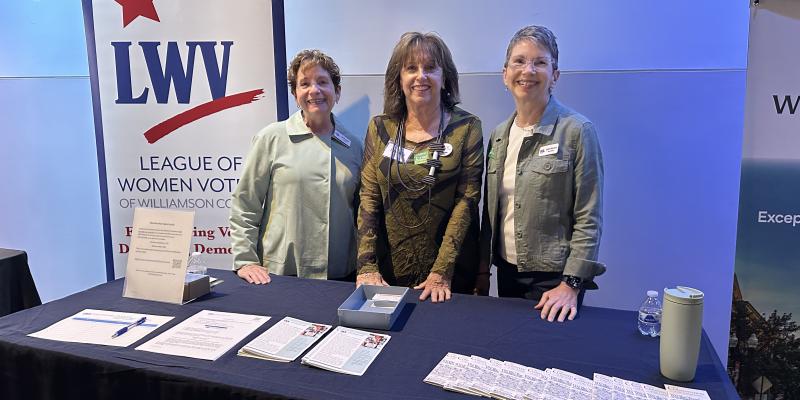 Photo of 3 boarf members at the event