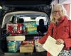 Jill with carload of diapers donated to Centro Hispano at 2024 annual meeting