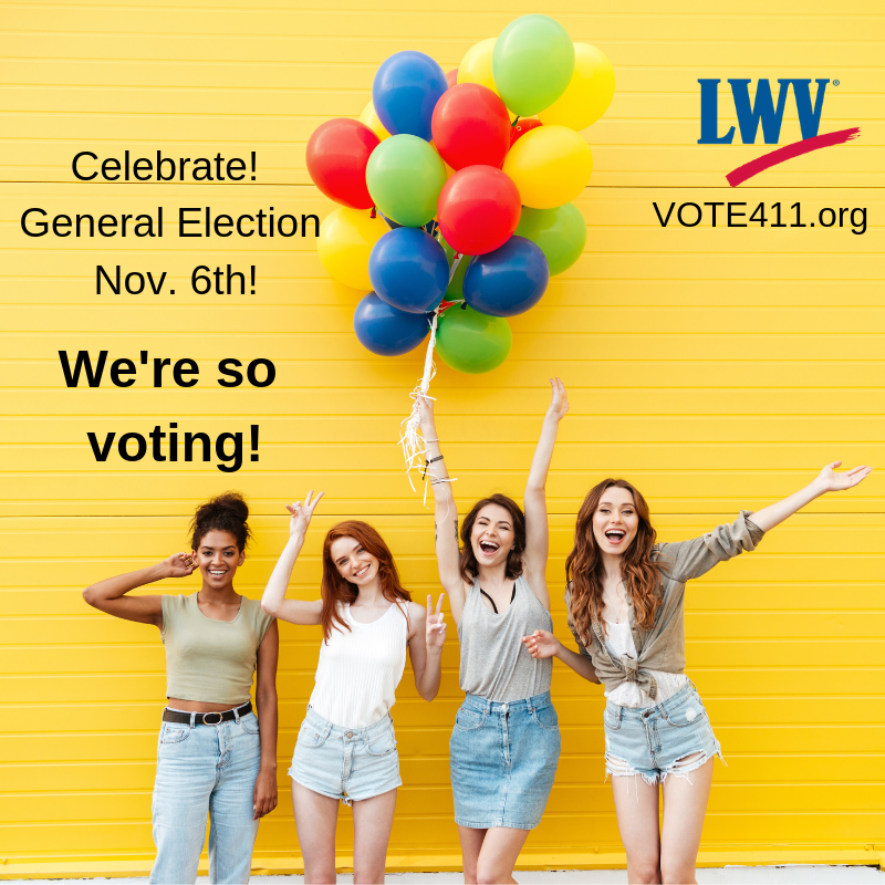 We're so voting! We're so voting! Four young women with balloons