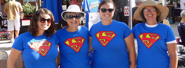 Four LWV members wearing blue super LWV tee shirts